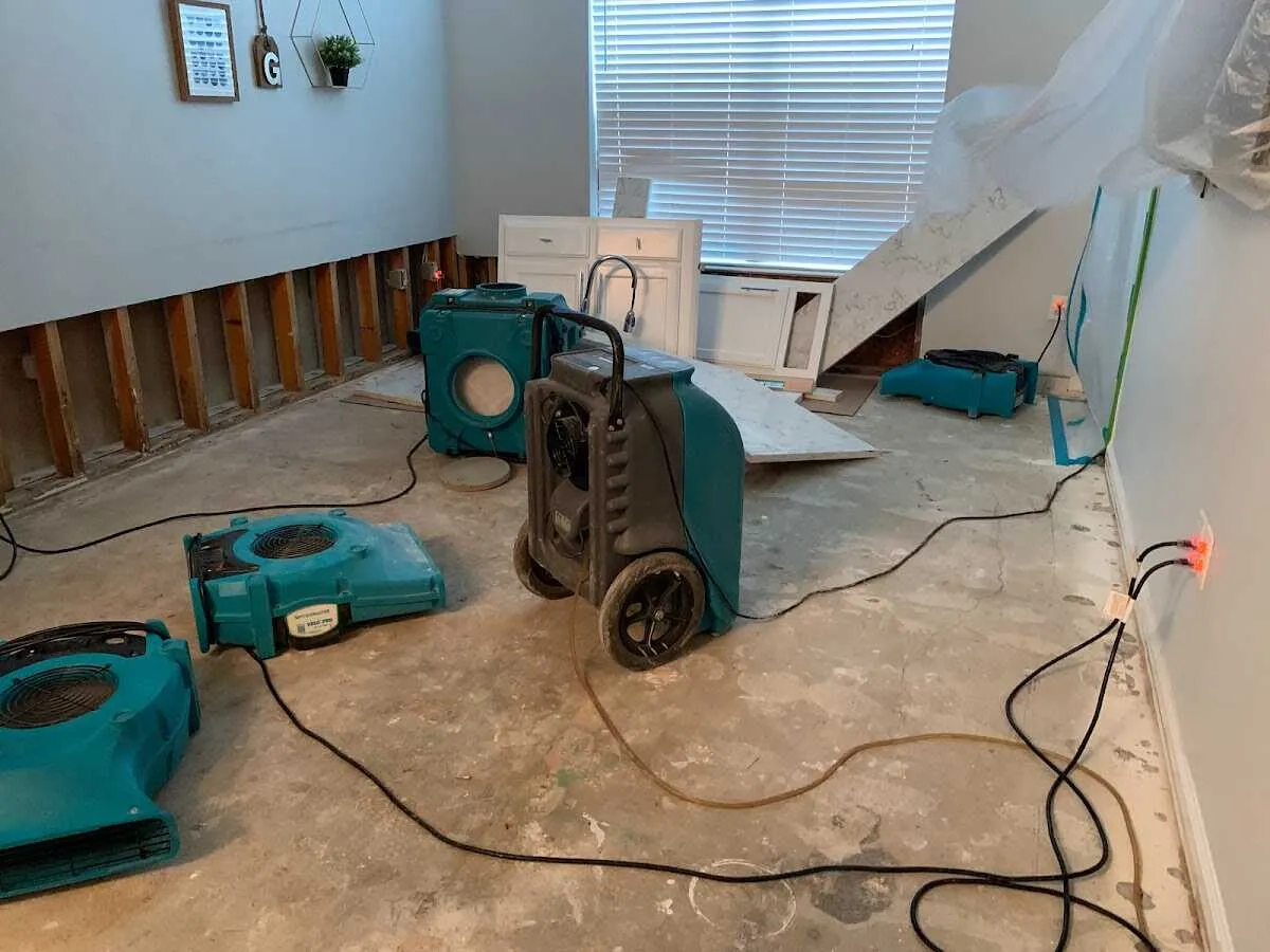 Dehumidifier in flood-cut room for Water Damage Restoration in Irvington